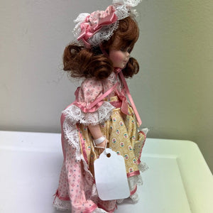 8 Inch Robin Woods Vinyl Doll 1990 with Dress and Bonnet