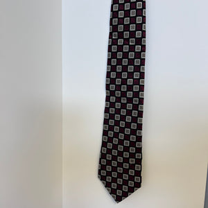 Patterned tie on a light gray background