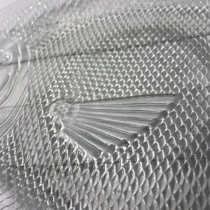Close-up of a textured surface with a geometric pattern