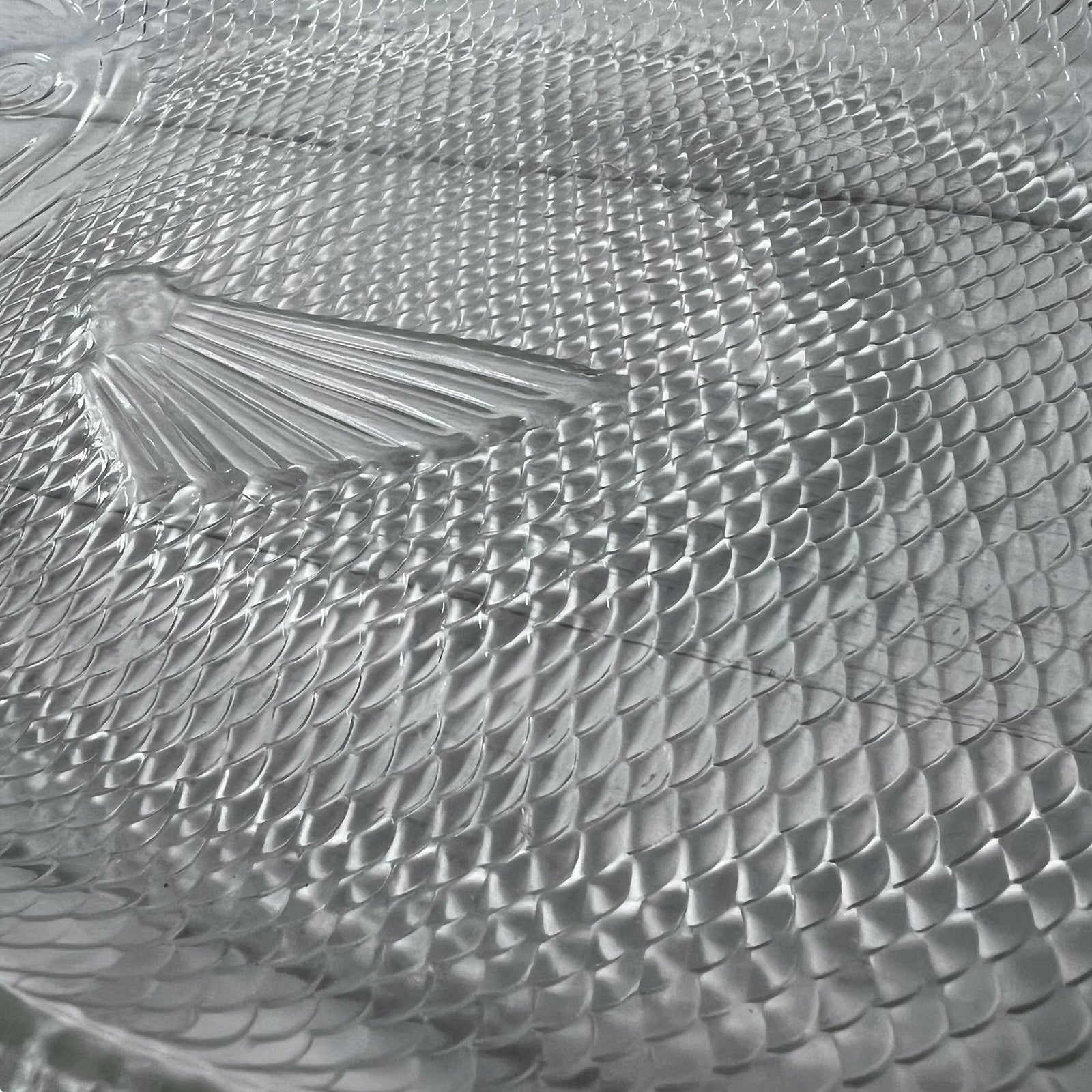 Close-up of a textured metal surface with intricate patterns