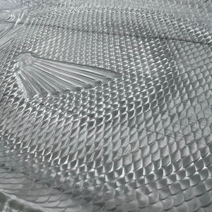 Close-up of a textured metal surface with intricate patterns