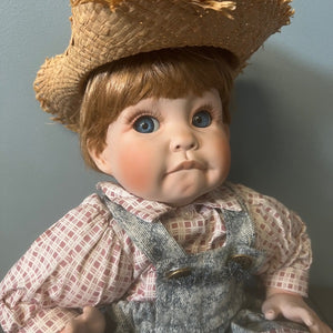 Cindy Marschner Porcelain Doll Seated Boy Doll with Straw Hat 17 inch