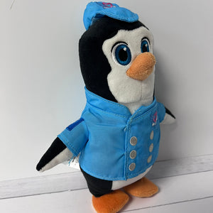 Plush penguin toy wearing a blue outfit with a white background