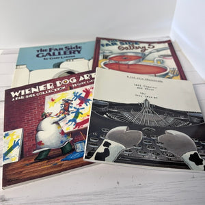 Collection of 'Far Side' themed books on a white surface