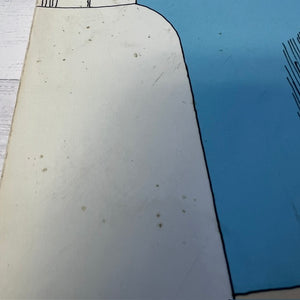 Close-up of a white surface with blue background