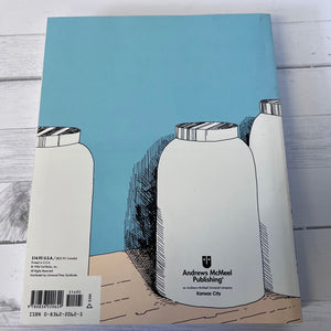 Book cover with illustrations of bottles and 'Andrews McMeel Publishing' logo on a light wooden surface.