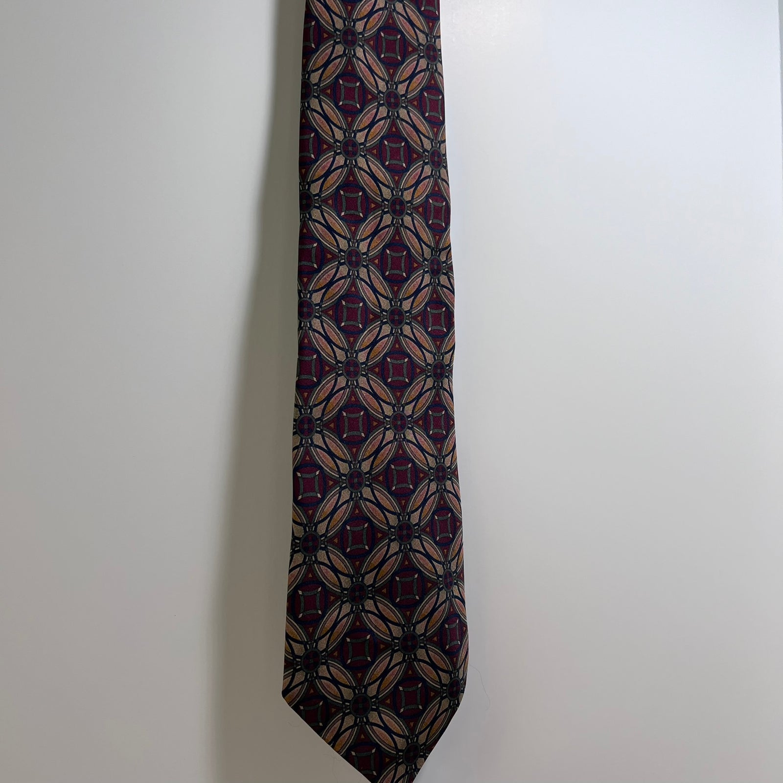 Patterned tie on a plain background