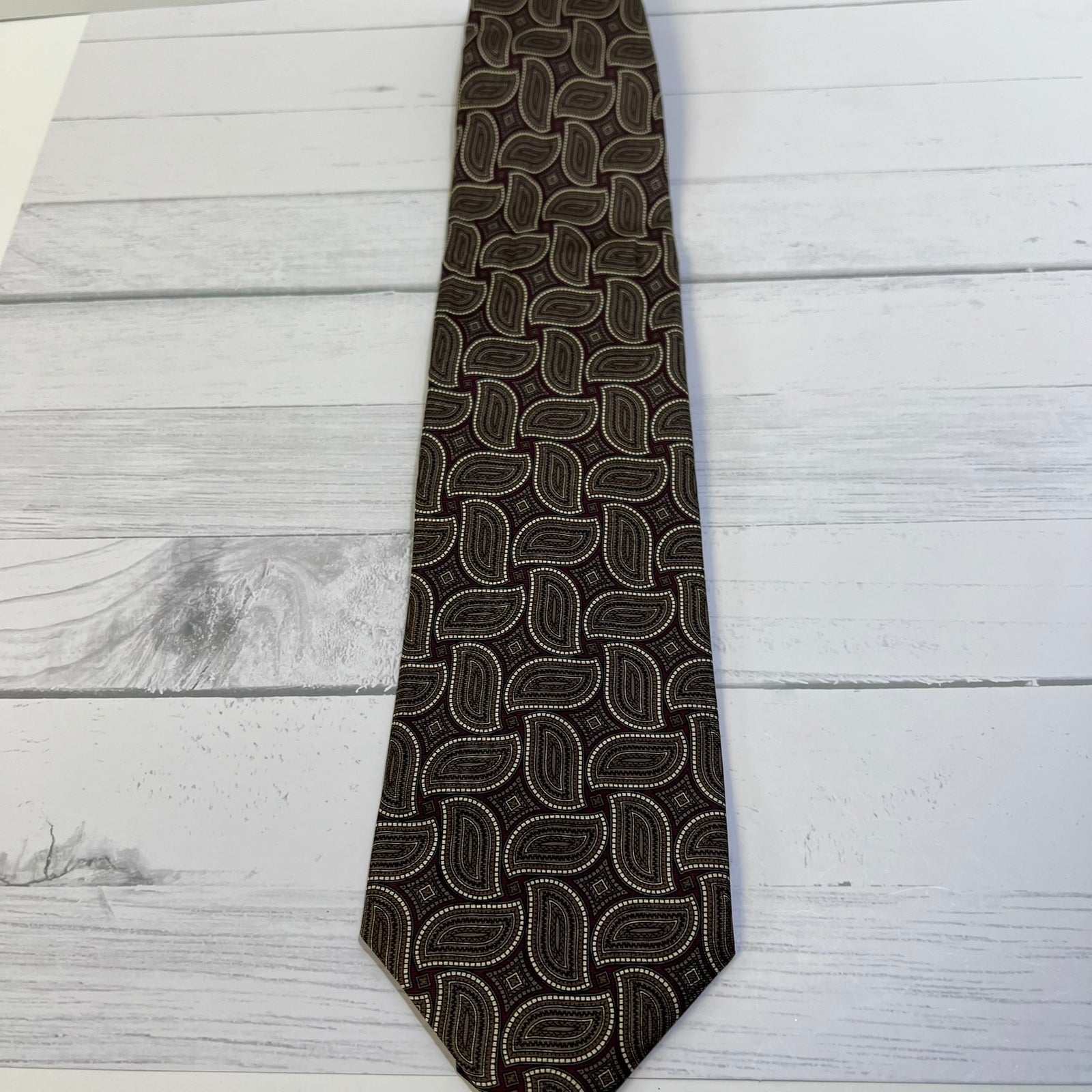 Patterned tie on a wooden surface