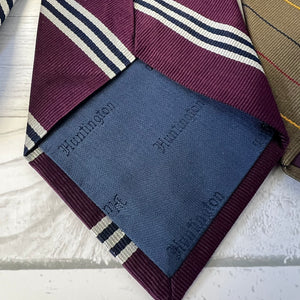 Burlington branded tie and pocket square on a textured surface