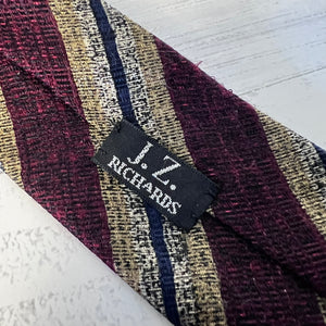Close-up of a striped fabric with a J.Z. Richards label.