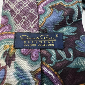 Floral patterned fabric with a label indicating 'Ostini de la Renta Couture Collection'.