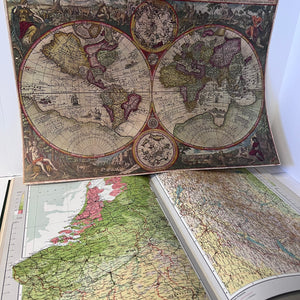 Vintage world map on an open book