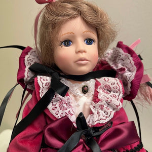 Robin Woods 14in Vinyl Doll Hannah Black and Burgundy Dress