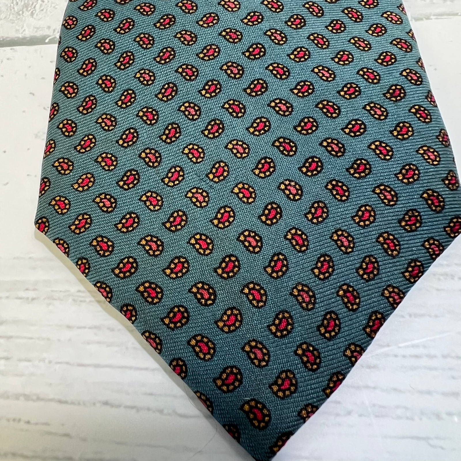 Patterned tie on a wooden surface