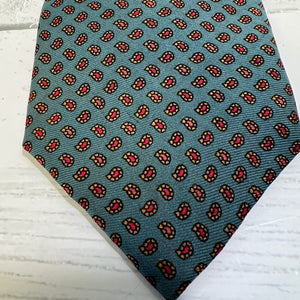 Patterned tie on a wooden surface