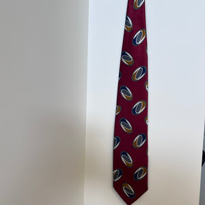 Maroon tie with football pattern on a white background