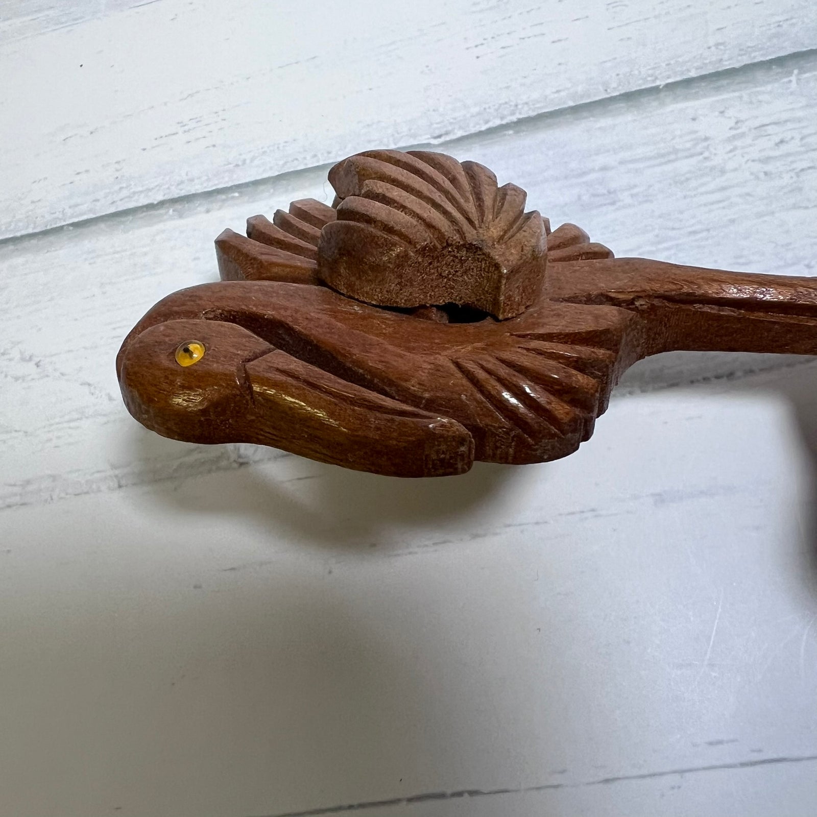Vintage hand-carved wooden flamingo brooch dating to the 1940s