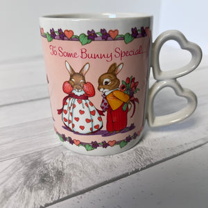 Mug with rabbit design and text 'To Some Bunny Special' on a white surface.