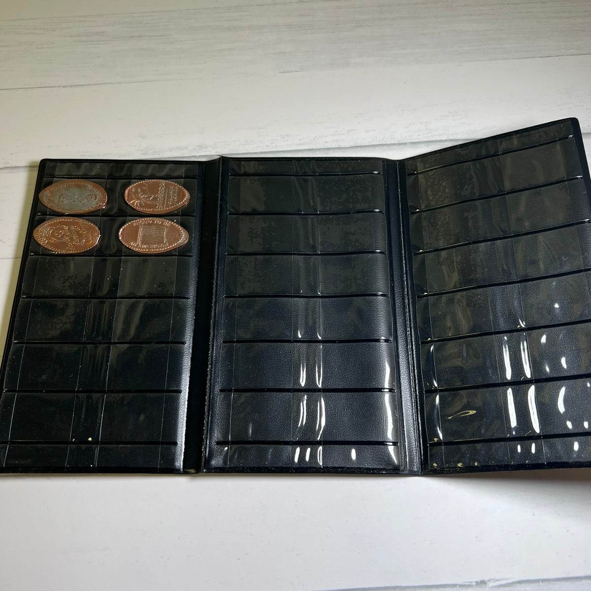1999 Universal Studios Escape Pressed Penny Album w 4 Elongated Pennies