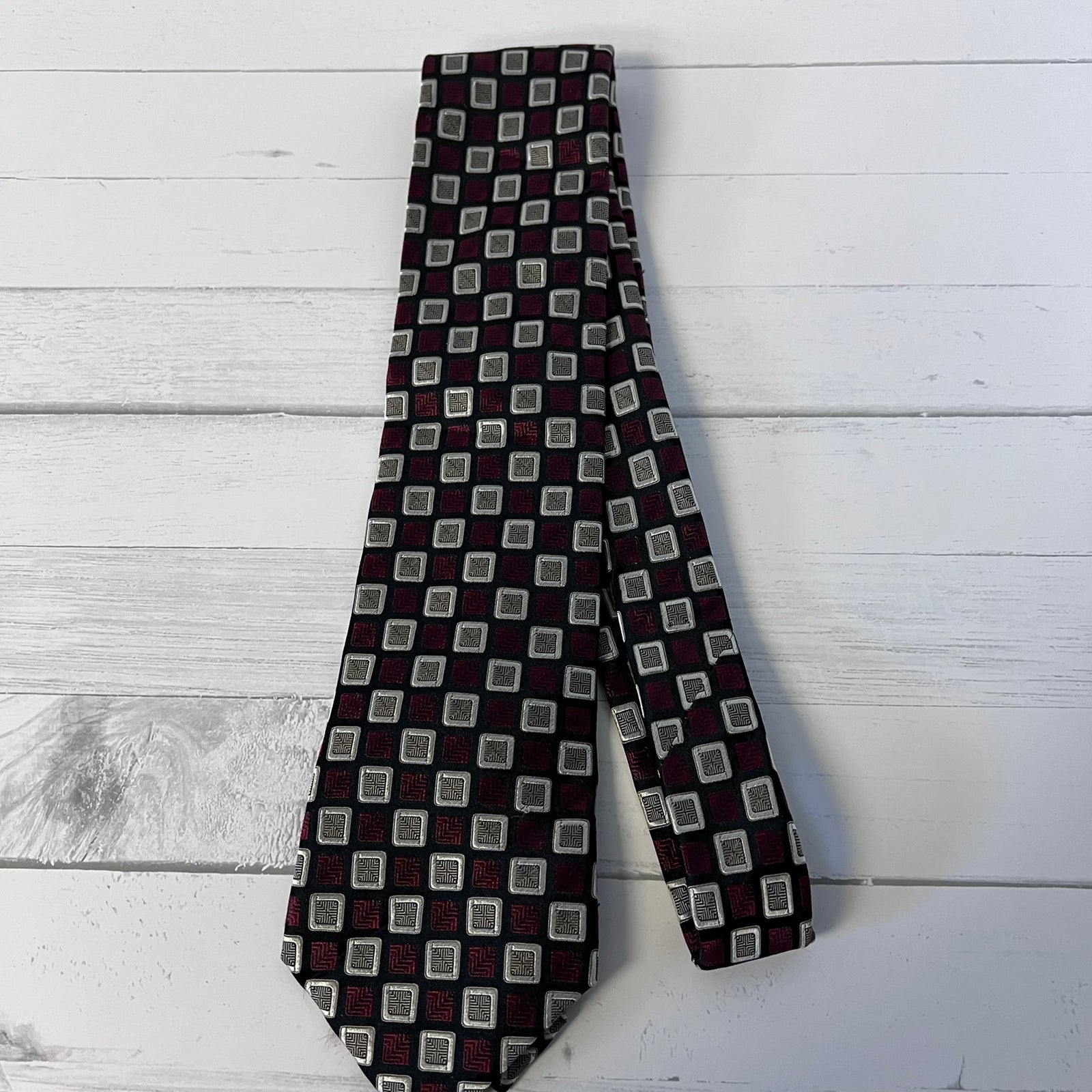 Patterned tie on a wooden surface
