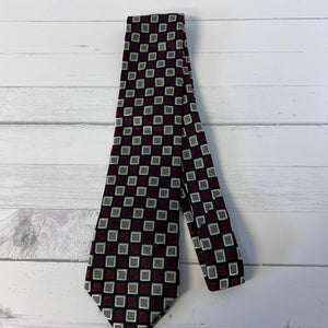 Patterned tie on a wooden surface