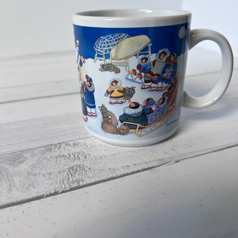 Mug with a colorful design of people and animals on a white surface