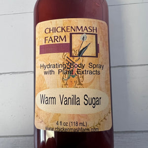 Bottle of Chickenmash Farm Warm Vanilla Sugar body spray on a light background