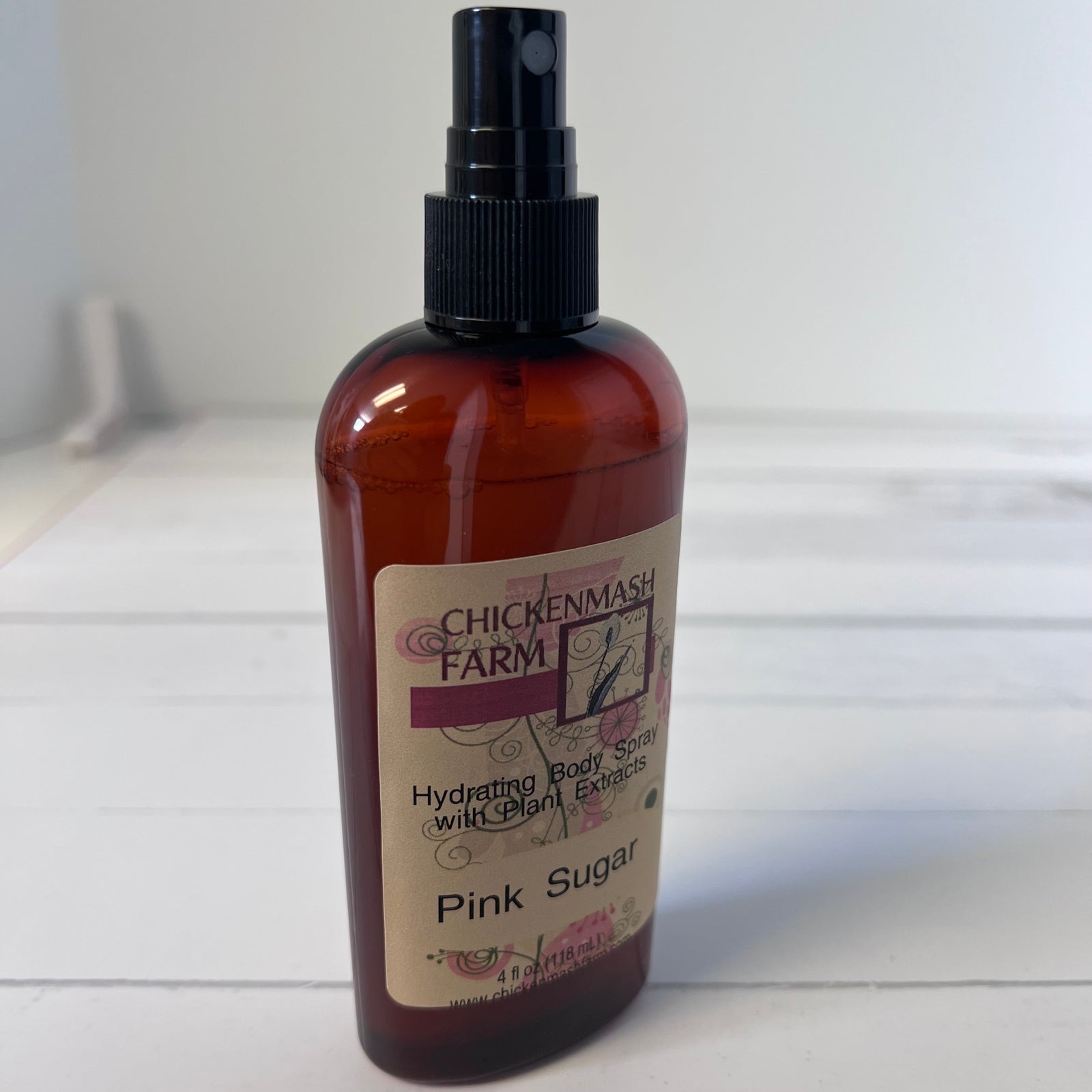 pink sugar body spray side view white background