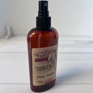 pink sugar body spray side view white background