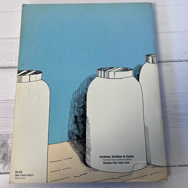 Book cover with illustration of milk bottles on a blue background