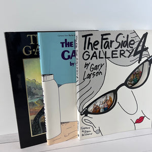 Three books from 'The Far Side Gallery' series by Gary Larson on a white surface.
