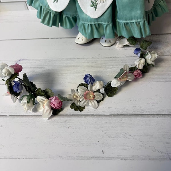 Daisy Doll with floral daisy spray