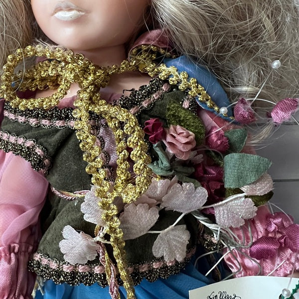 Close-up of a doll with decorative clothing and accessories