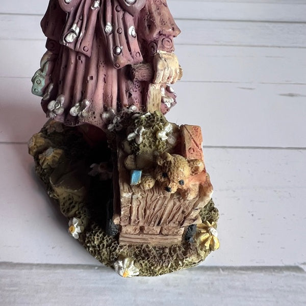 Vintage Girl Figurine Pulling A Wagon Purple Dress and Hat