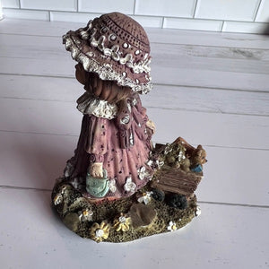 Vintage Girl Figurine Pulling A Wagon Purple Dress and Hat