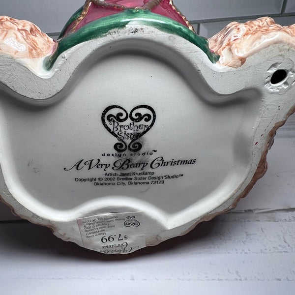 Back of a ceramic product with 'Brother Sister Design Studio' branding and text.