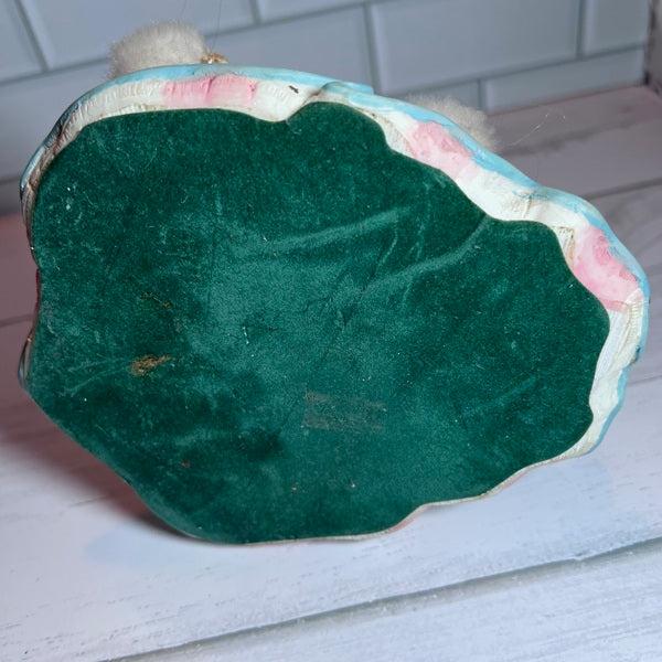 bottom of figurine