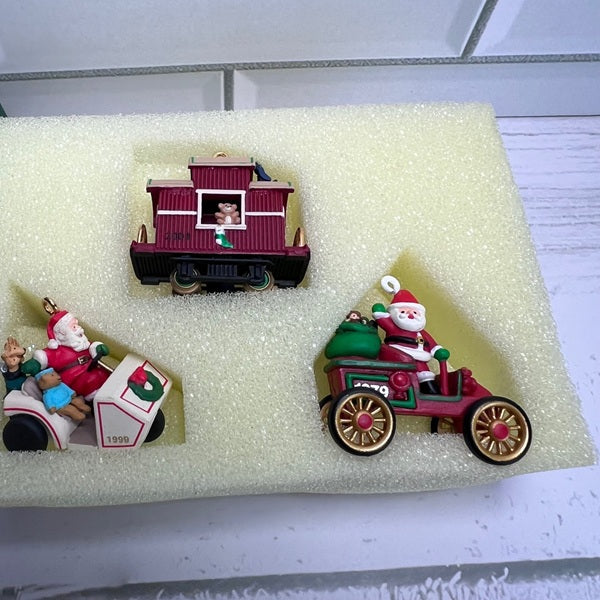 Set of Christmas-themed figurines on a white surface