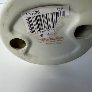 Bar code label on a ceramic product with 'Formalities by Bausch & Lomb' branding.