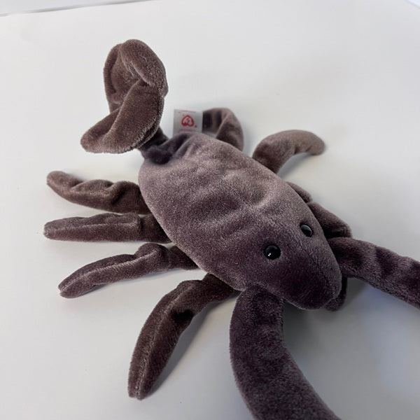 Plush toy scorpion on a white background