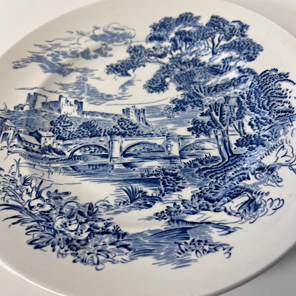 Blue and white scenic plate with a bridge and landscape