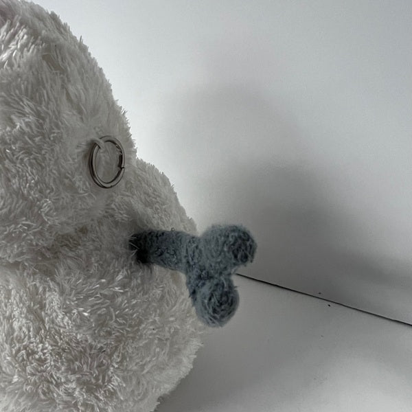 Close-up of a plush toy with a white background