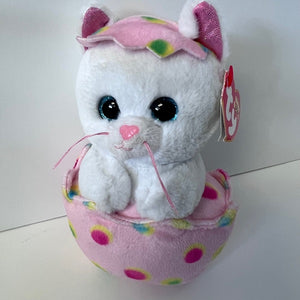 Plush toy cat with a colorful hat on a white background