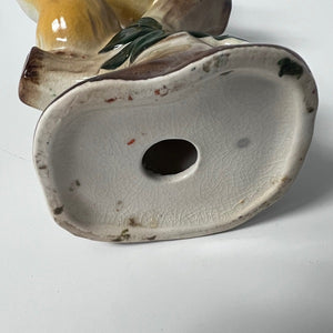 bottom of figurine 