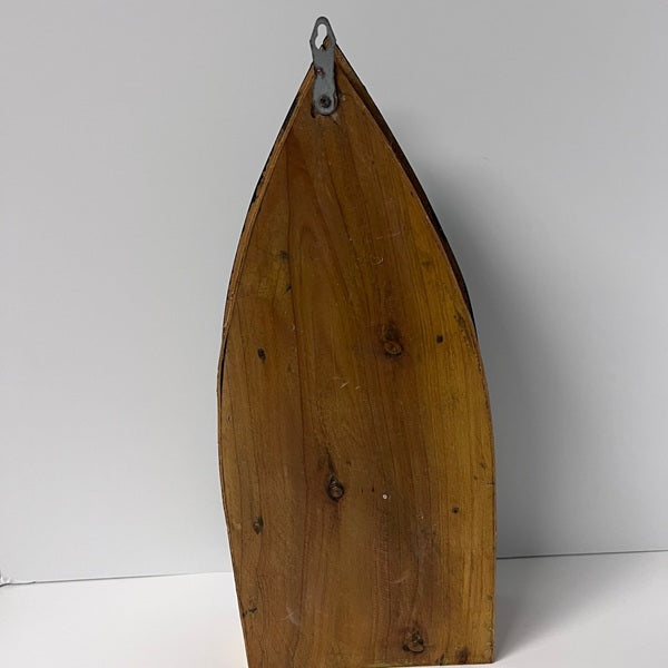 Wooden boat model on a white background