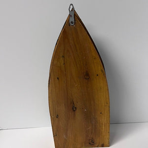 Wooden boat model on a white background