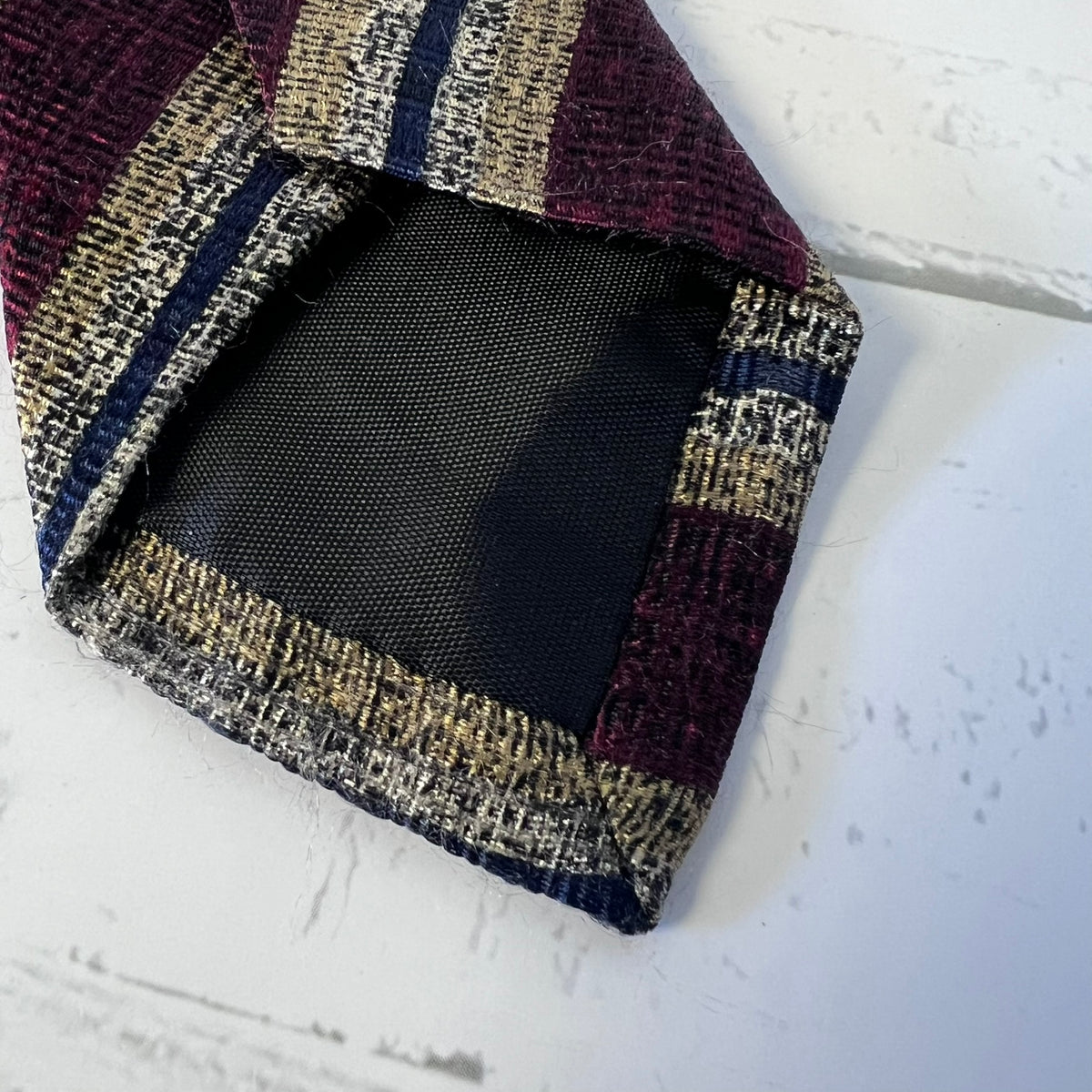 Textured fabric with a checkered pattern on a white surface