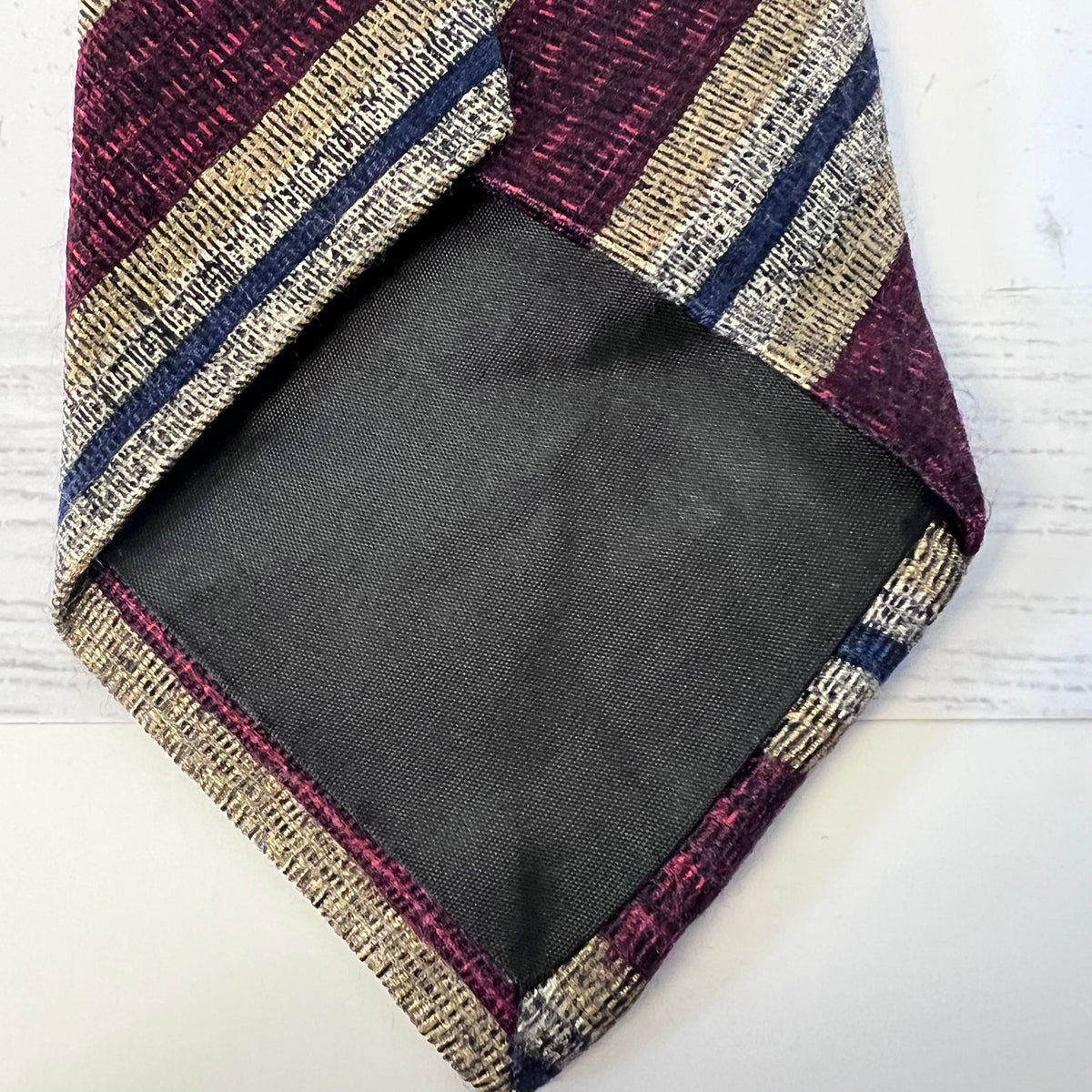 Textured fabric with a geometric pattern on a white background