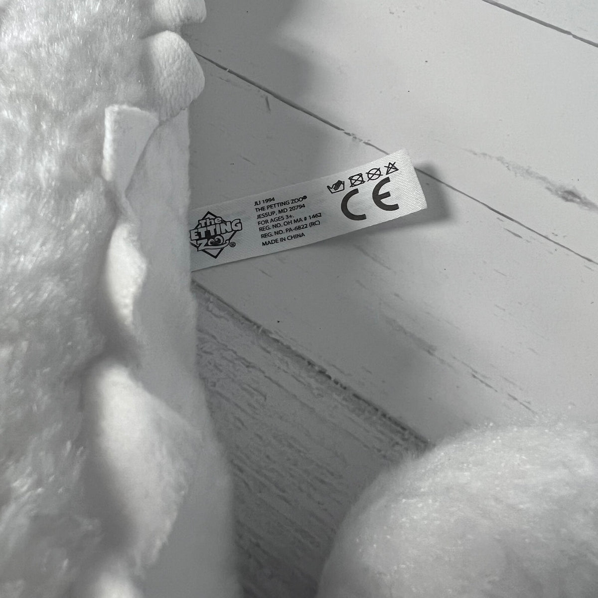 Close-up of a label on a product with visible text and symbols.
