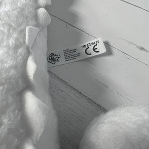 Close-up of a label on a product with visible text and symbols.